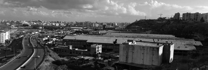 Black and white photo of Ghandour Factories in Tripoli, Lebanon featured on blfheadquarters.com the architecture blog of Banque Libano-Française (BLF)